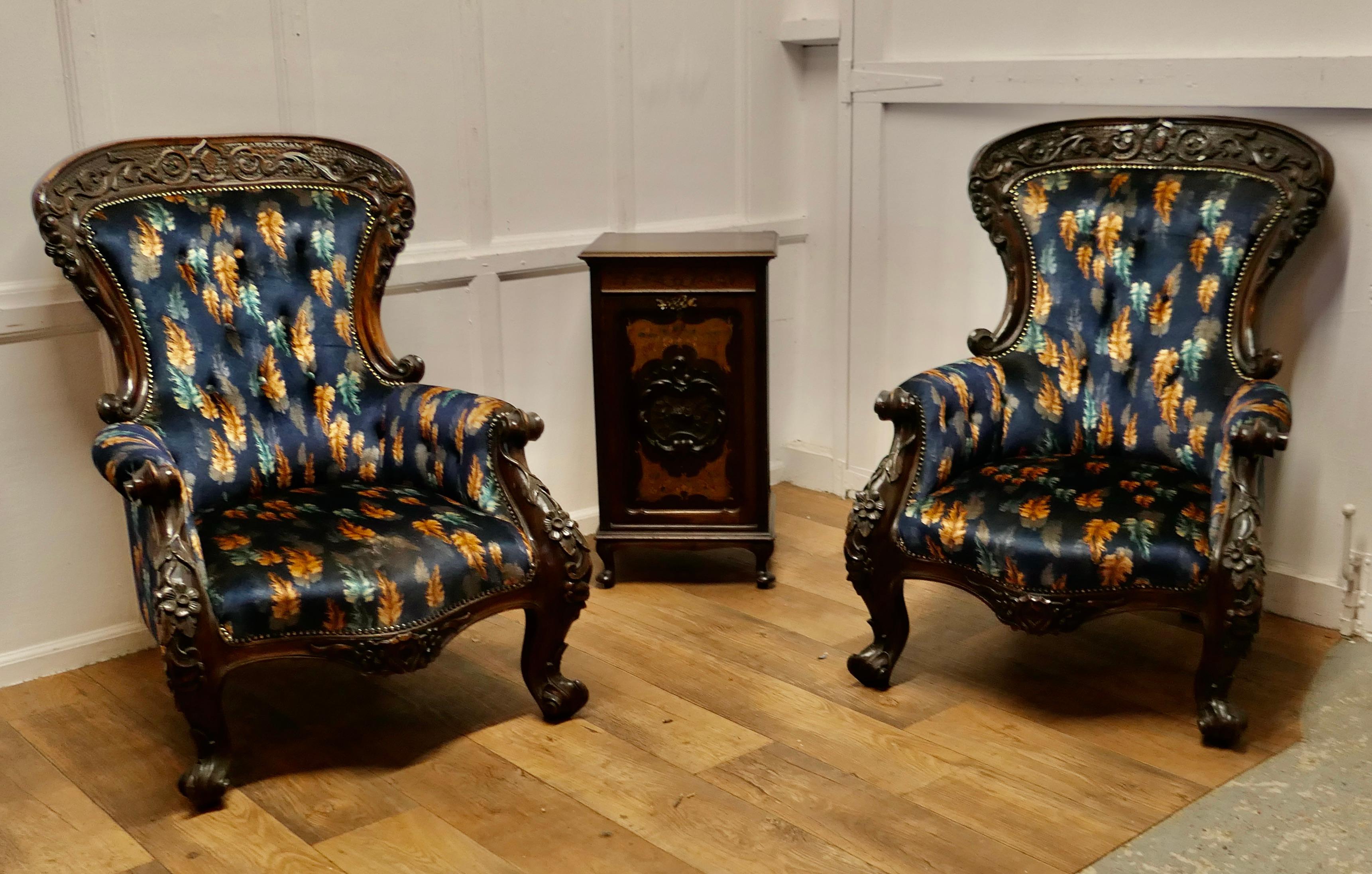 A Pair of Large Franco Chinese Carved Salon Chairs

A Pair of Superb Large Very Comfortable Salon Chairs
These chairs date from the late 19th century, the are profusely carved, mostly on a floral and leaf design with central shields
The chairs have