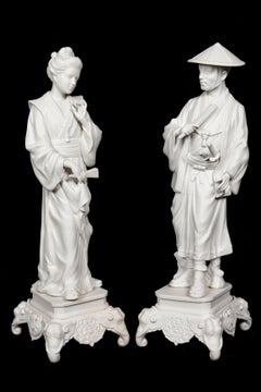 A Pair of Large French Chinoiserie Style White Porcelain Figures