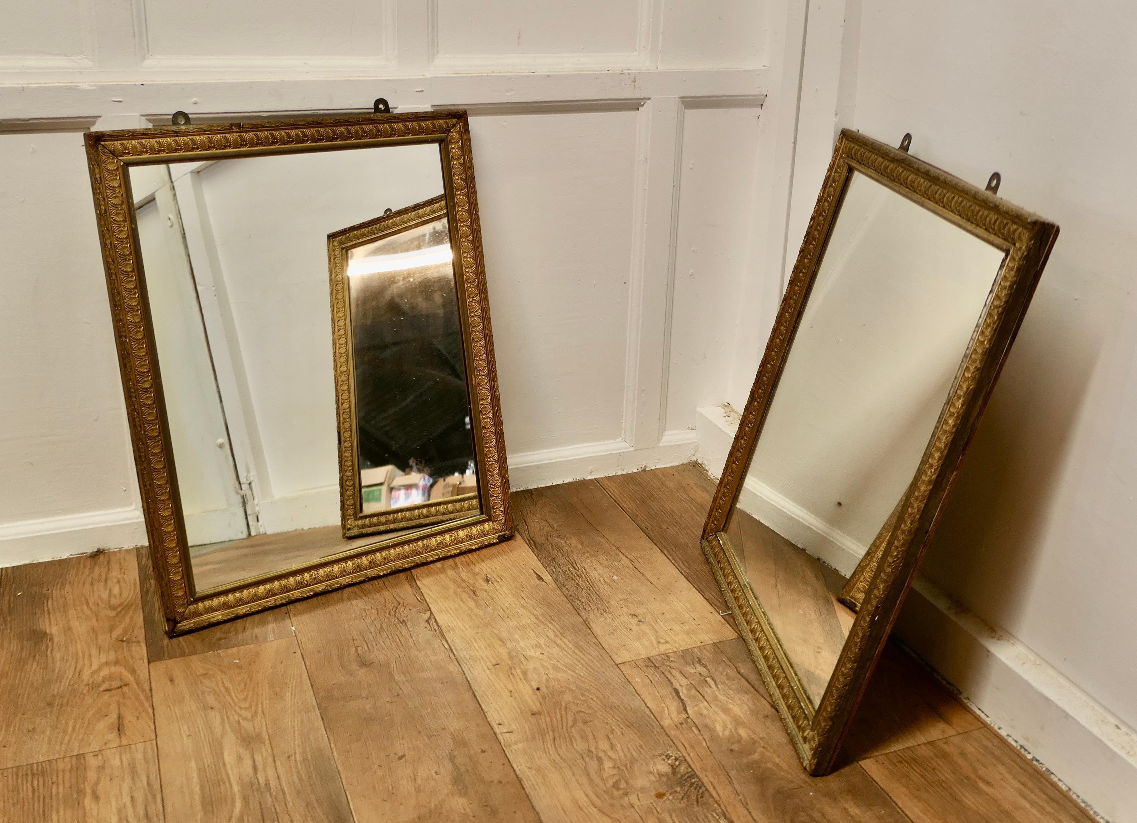 A Pair of Large Gilt Mirrors

The mirrors have lovely age darkened 2” wide moulded Gilt frames, they are in good condition for their age, there is some minor chipping to the gilt frames but nothing serious, these are heavy pieces and they are set