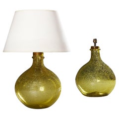 A Pair of Large Green Glass Vessels as Lamps