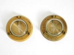 A pair of large, heavy 1950s maritime ship wall lamps made of brass and glass