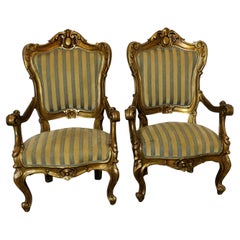 A Pair of Large Italian Carved GiltWood Arm Chairs  These are  large arm chairs