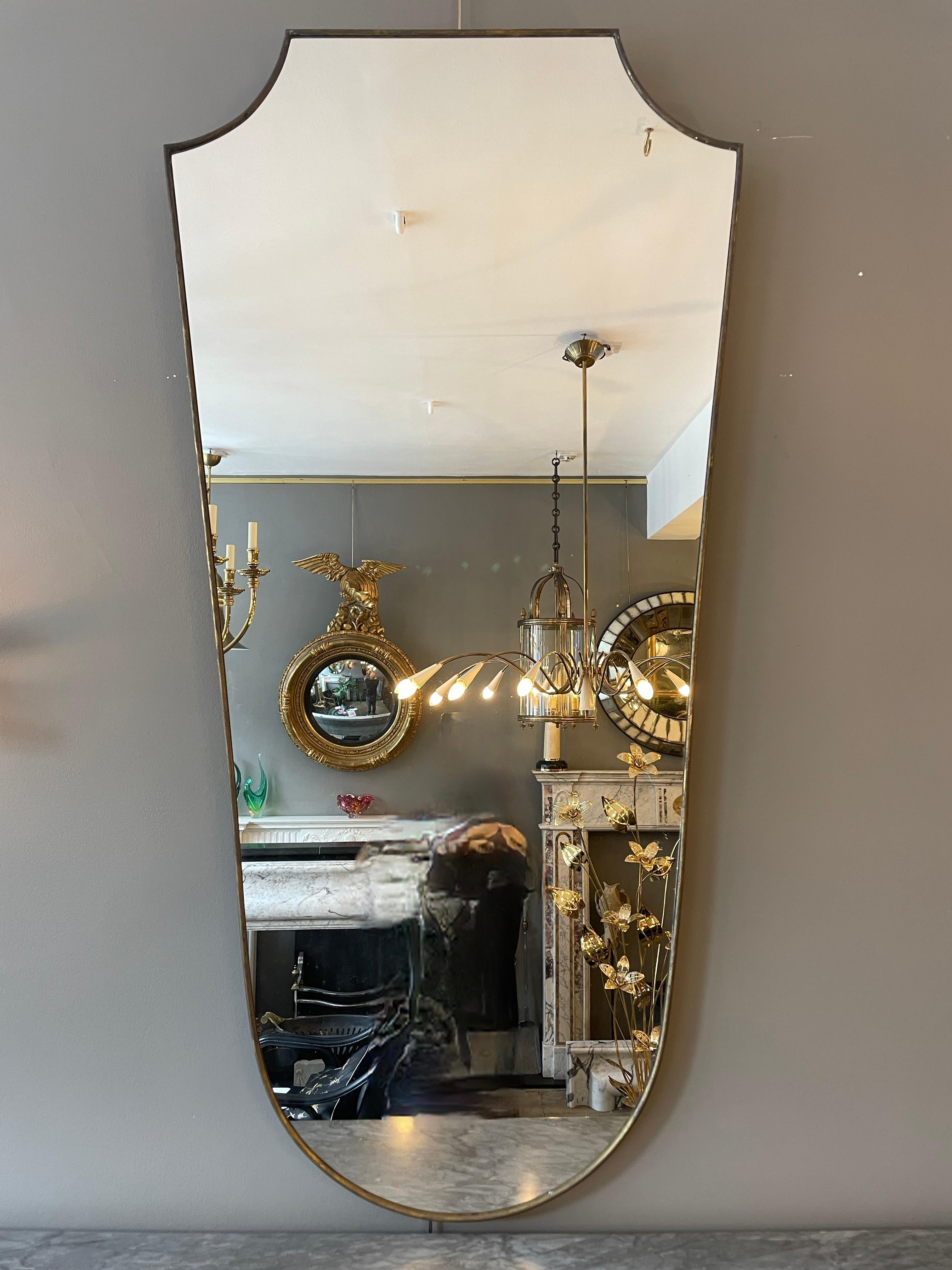 A Pair Of Large Italian Midcentury Brass Shield Mirrors  3