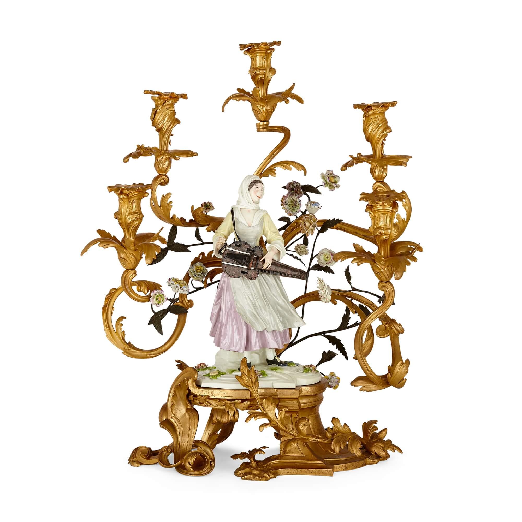 A pair of large Louis XV style gilt-bronze and Samson porcelain candelabra
French, Late 19th century
Measures: Height 68cm, width 54cm, depth 36cm

Crafted with great artistry and skill by the Samson porcelain manufactory in late nineteenth