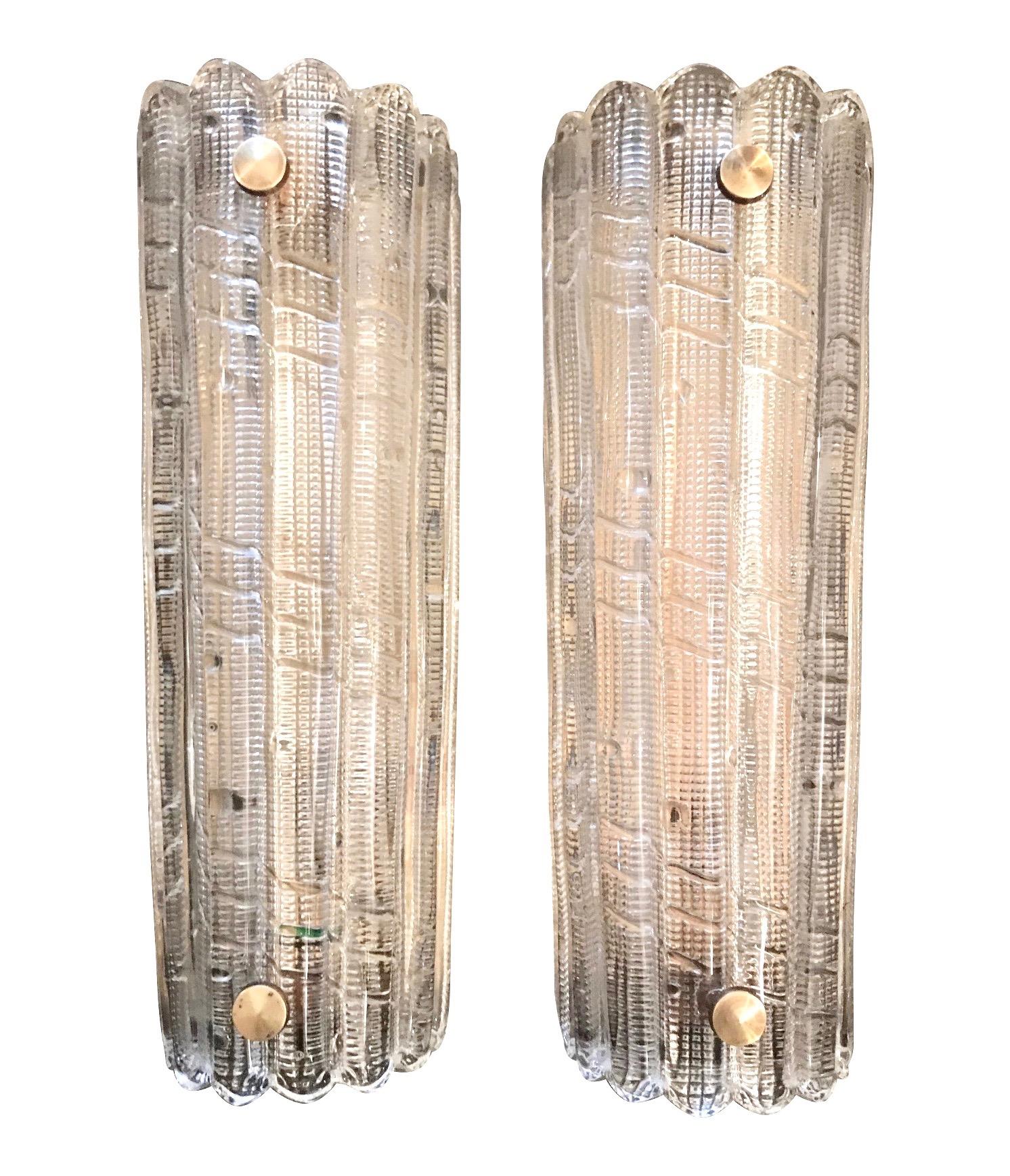 A pair of large clear Orrefors glass wall sconces with bubble design by Carl Fagerlund mounted on brass plates with a single light fitting. Re wired with new fittings and PAT tested.