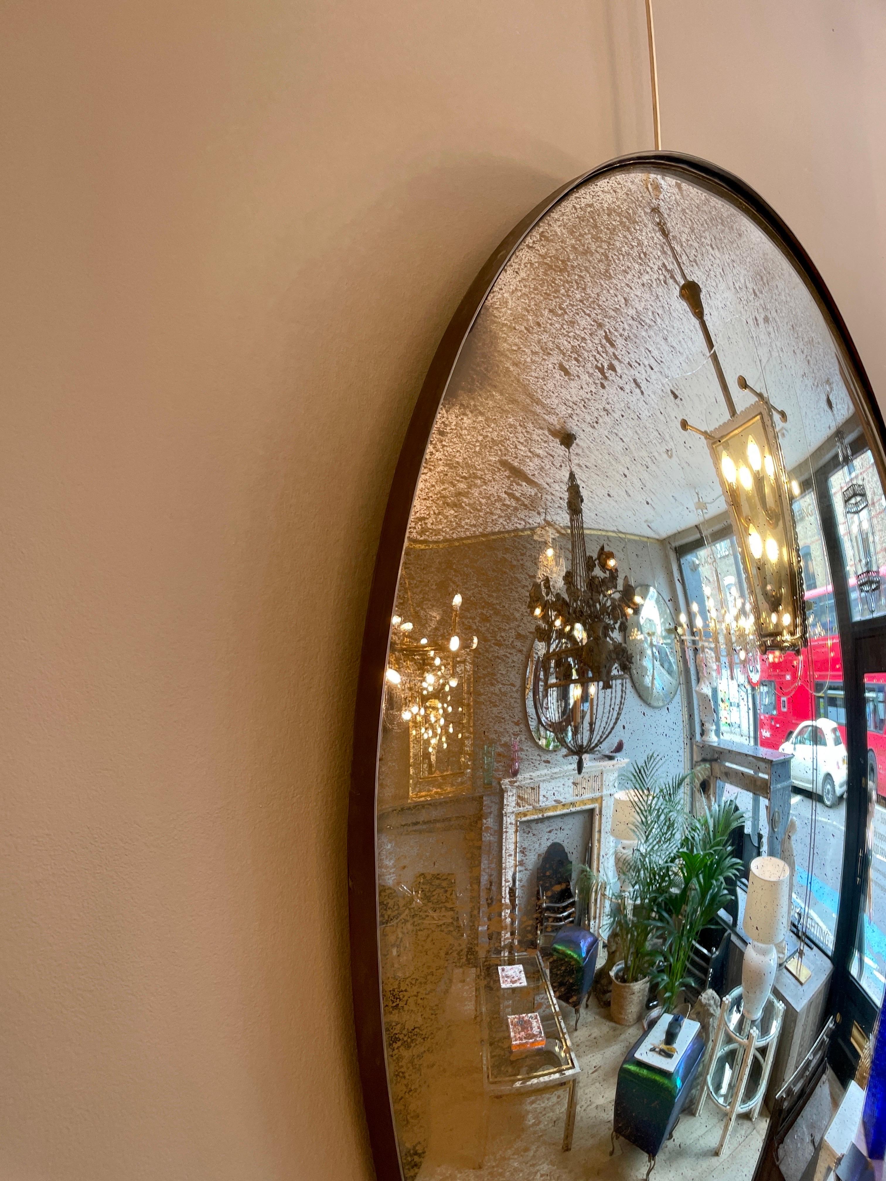Mid-Century Modern Pair of Large Oval Convex Mirrors