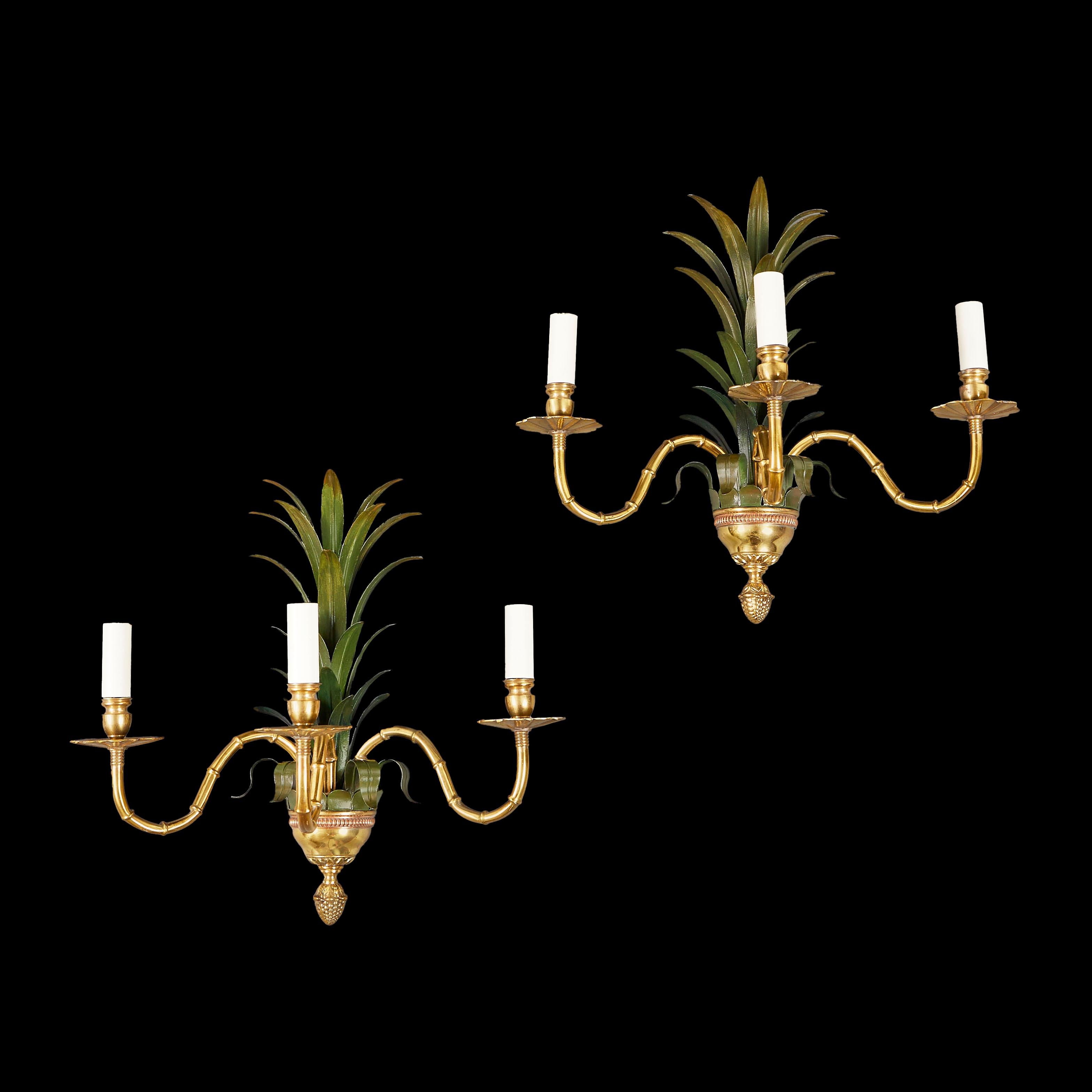 Hollywood Regency A pair of large palm frond brass wall lights 