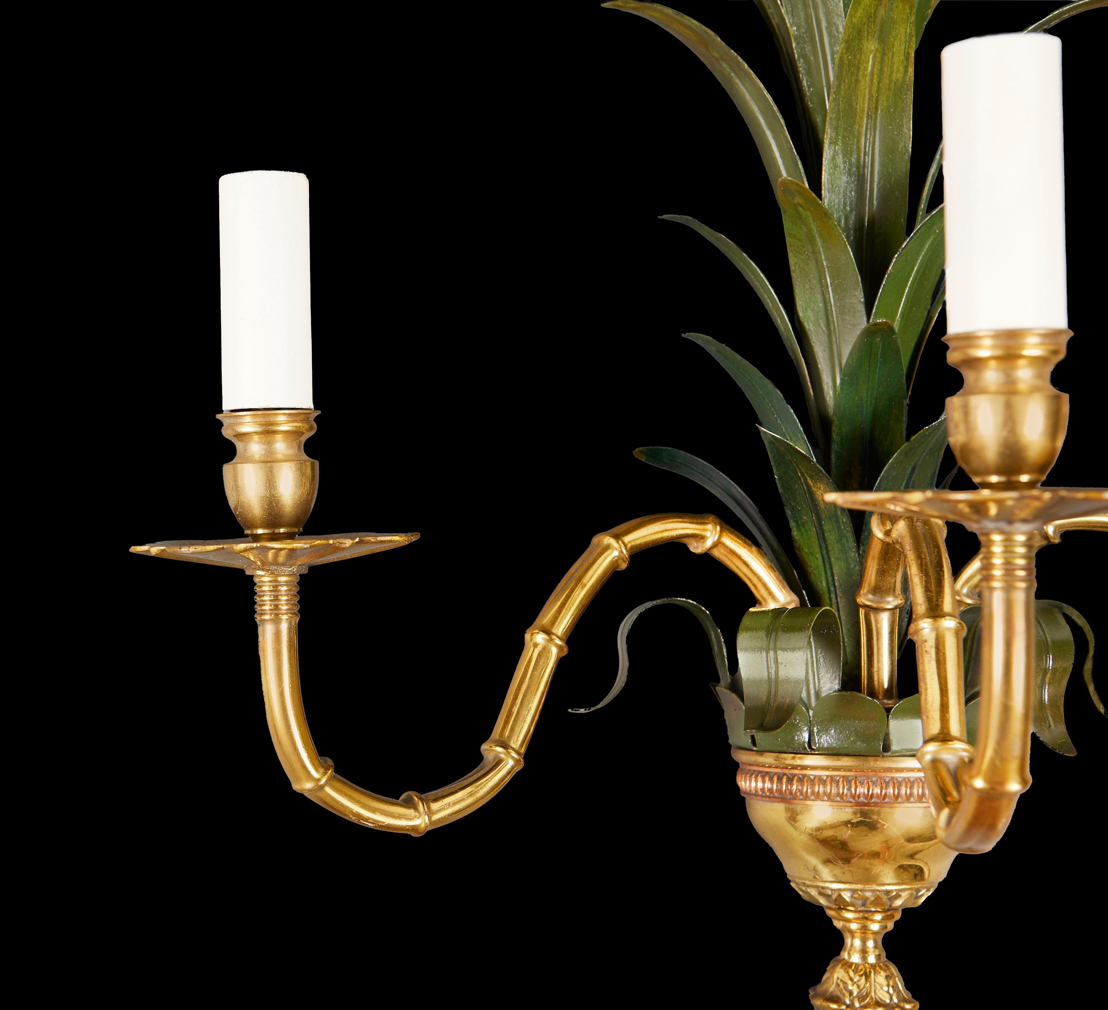 Hand-Painted A pair of large palm frond brass wall lights 