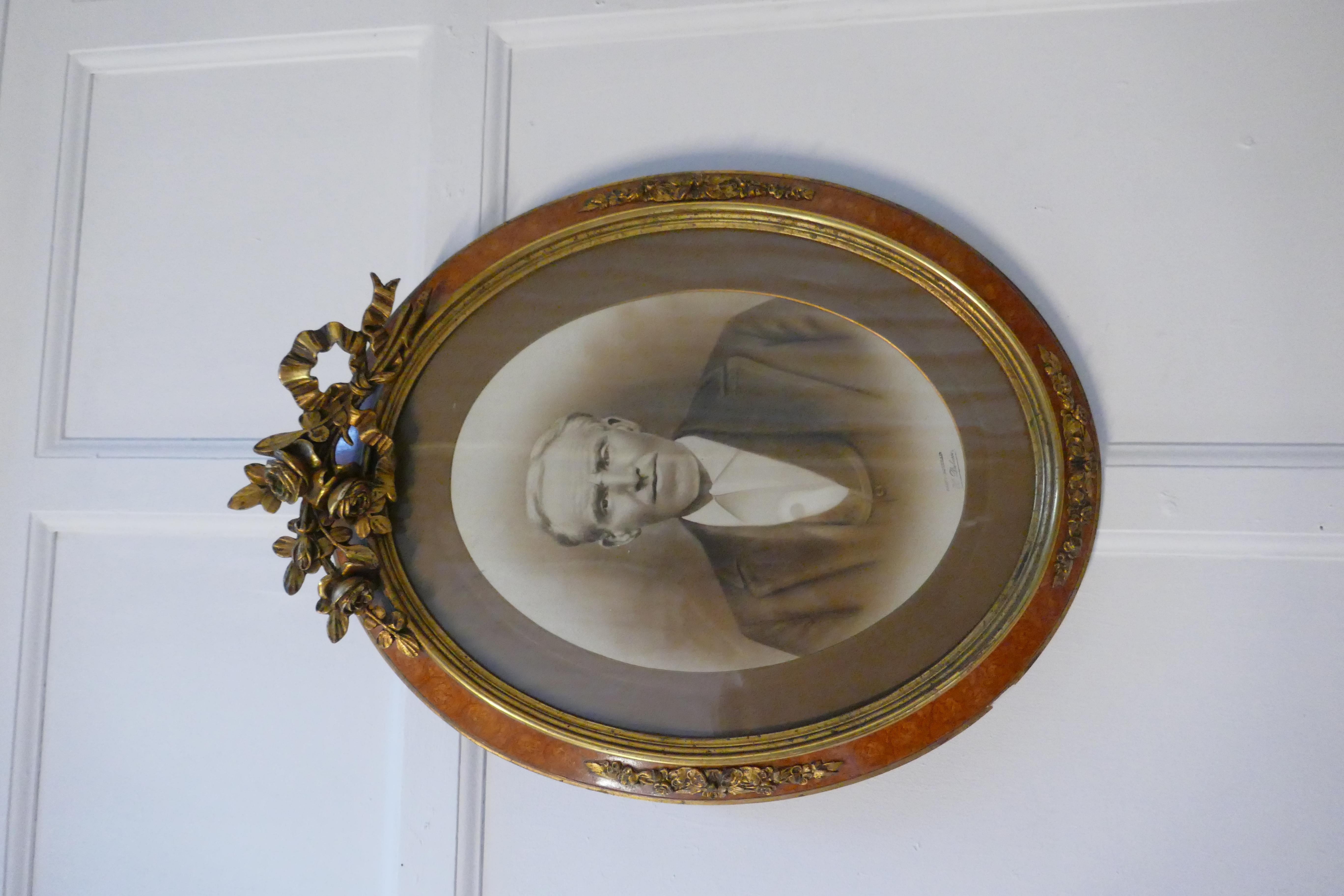 A pair of large portrait photographs in oval ormolu frames

This handsome couple come from Brest in France, I do not know the identity of the subjects but the pictures are by H Dubosse
The frames are in an Oyster veneer with ormolu roses and