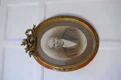 Pair of Large Portrait Photographs in Oval Ormolu Frames