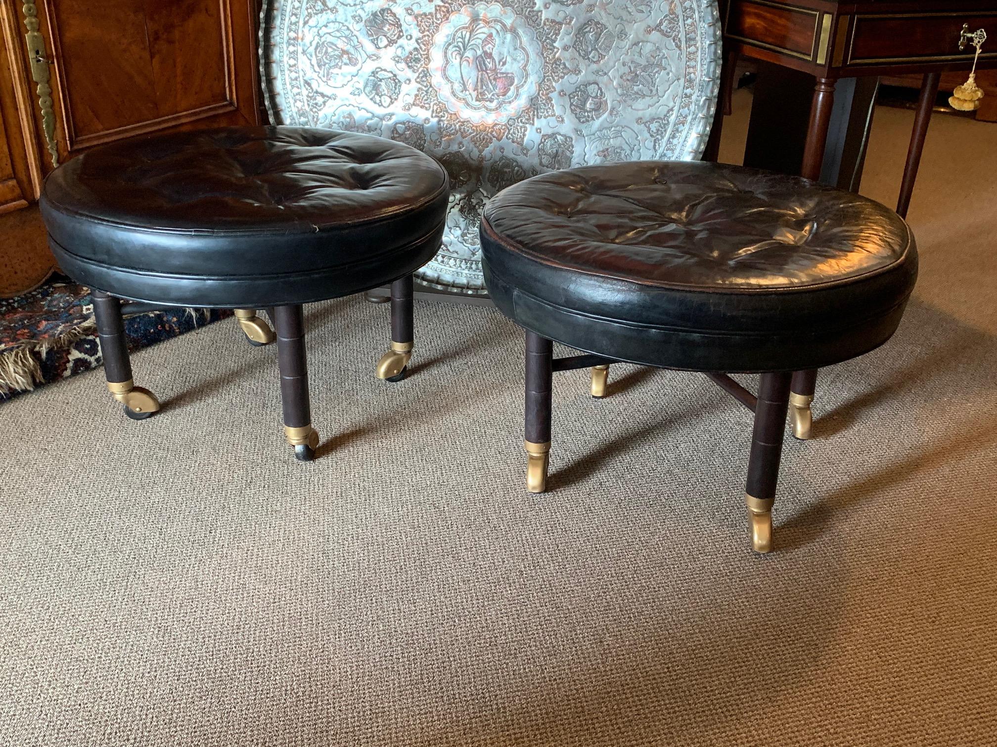 A Pair of Large Round Leather Ottomans by Baker In Good Condition In St.Petersburg, FL