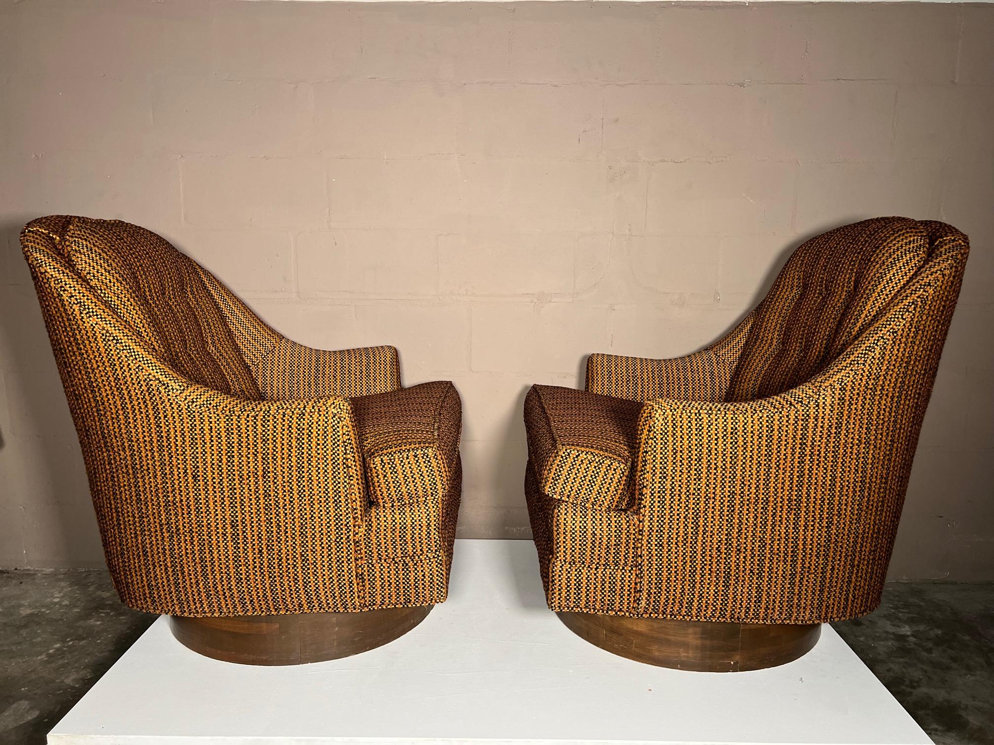American Pair of Large Scale Swivel Chairs
