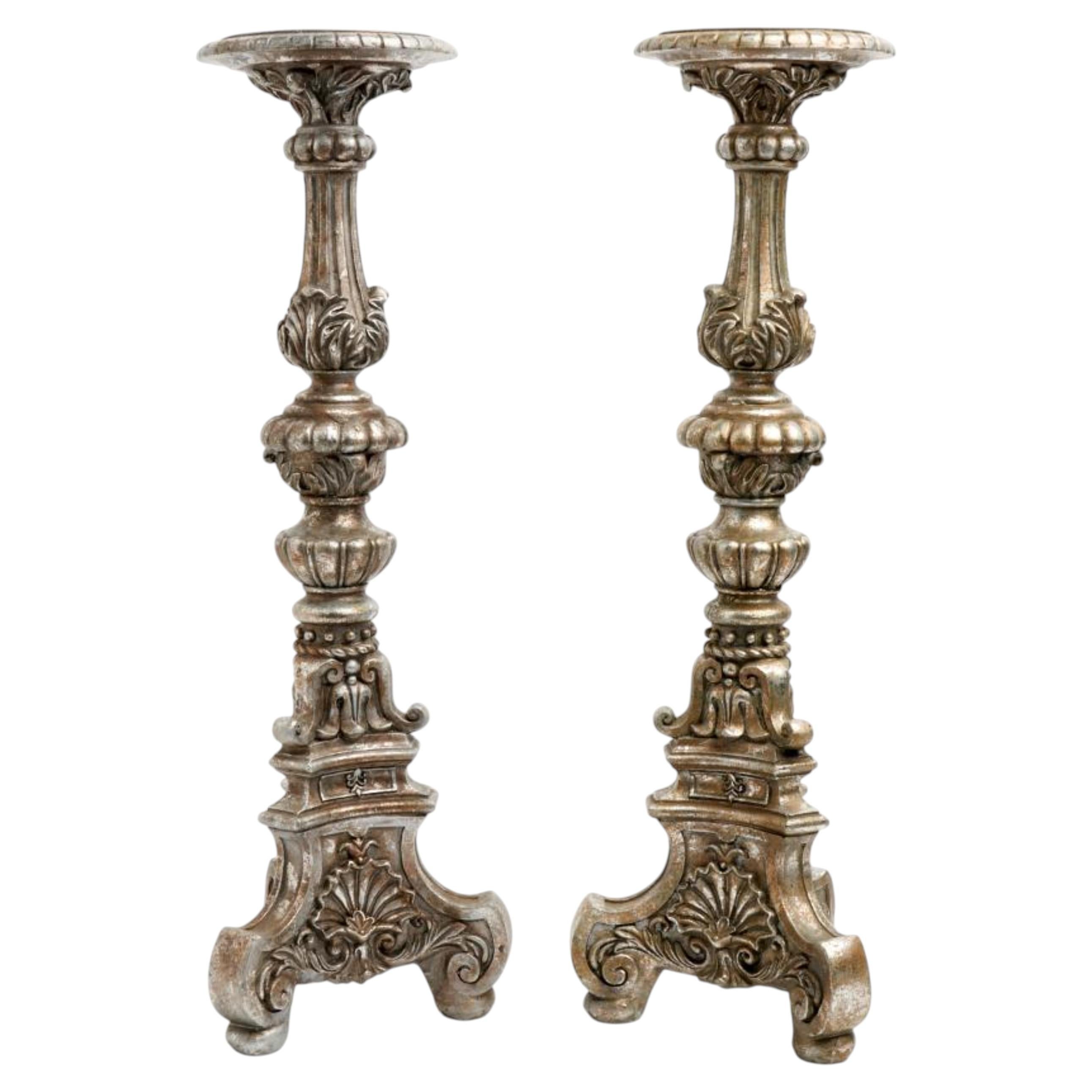 A Pair of Large Vintage Ornate Silvered Baroque Style Candlesticks