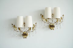 A pair of large wall lights by Paavo Tynell for Taito OY Model 9473