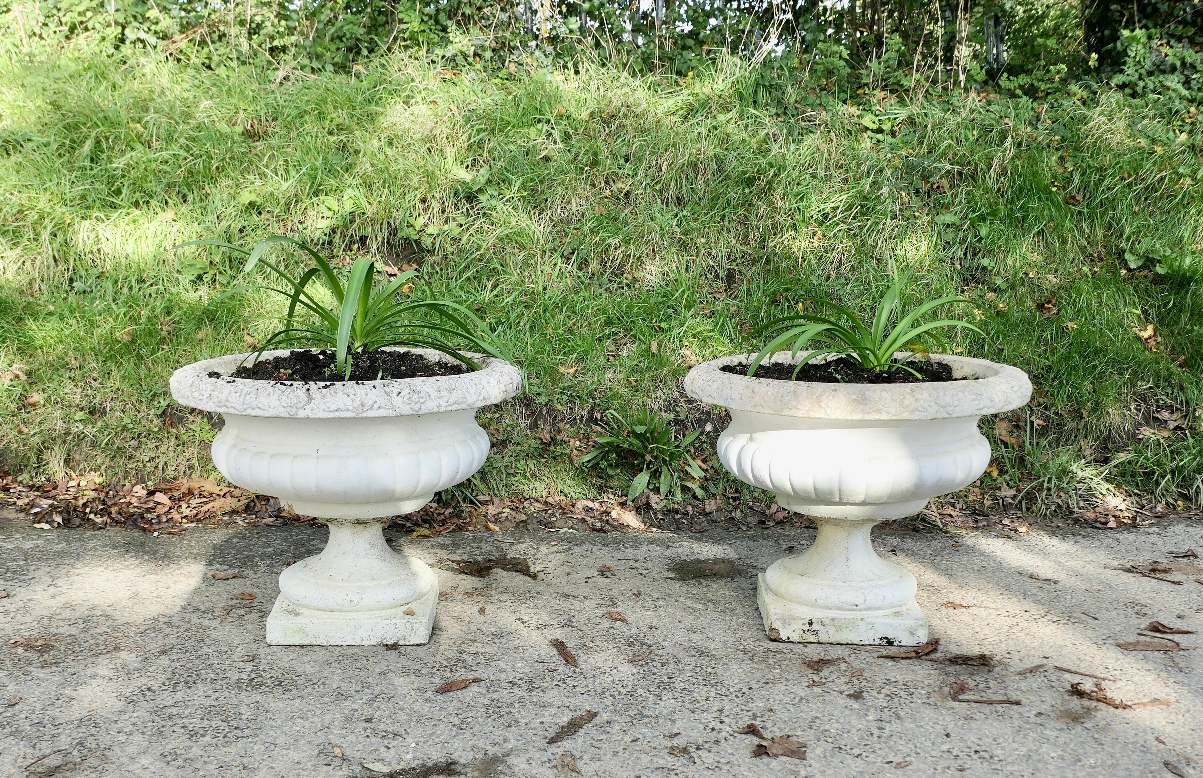 A Pair of Large Weathered Cast Stone Garden Planters For Sale 3