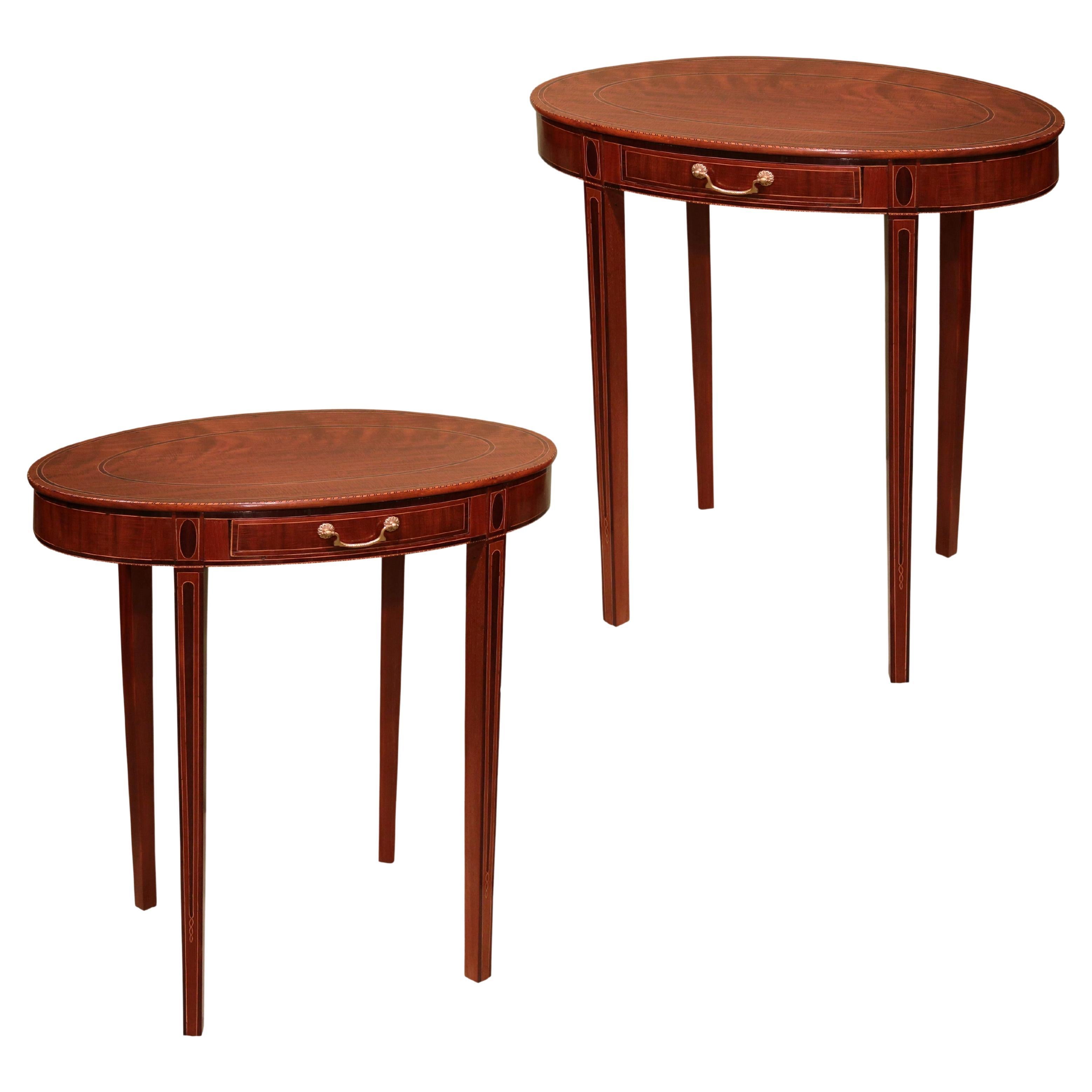 A pair of late 18th century Sheraton period mahogany oval occasional tables For Sale