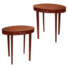 Antique A pair of late 18th century Sheraton period mahogany oval occasional tables