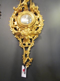 Pair of Late 19th Century Chinoiserie Carved and Gilt Convex Mirrors