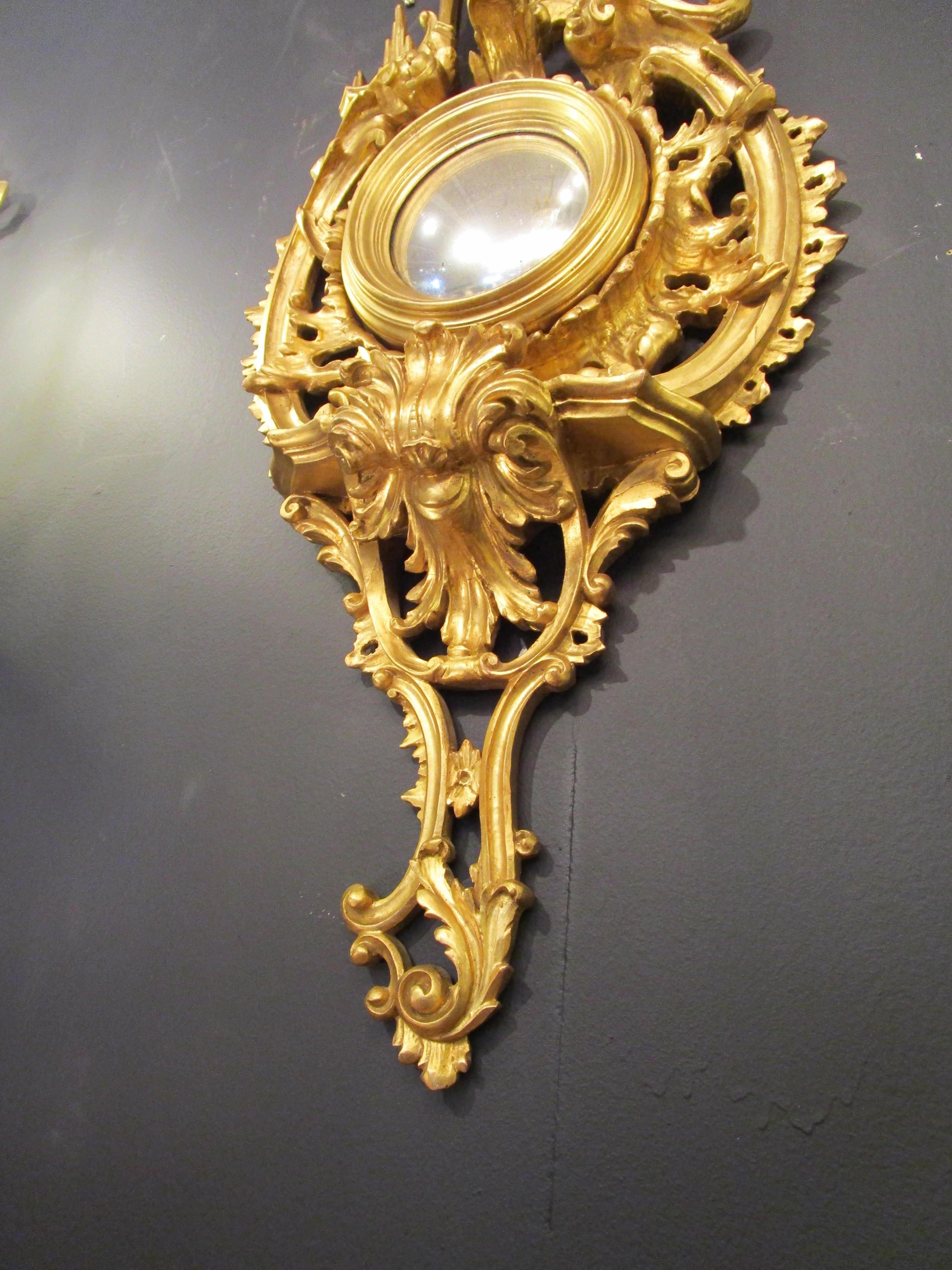English Pair of Late 19th Century Chinoiserie Carved and Gilt Convex Mirrors For Sale