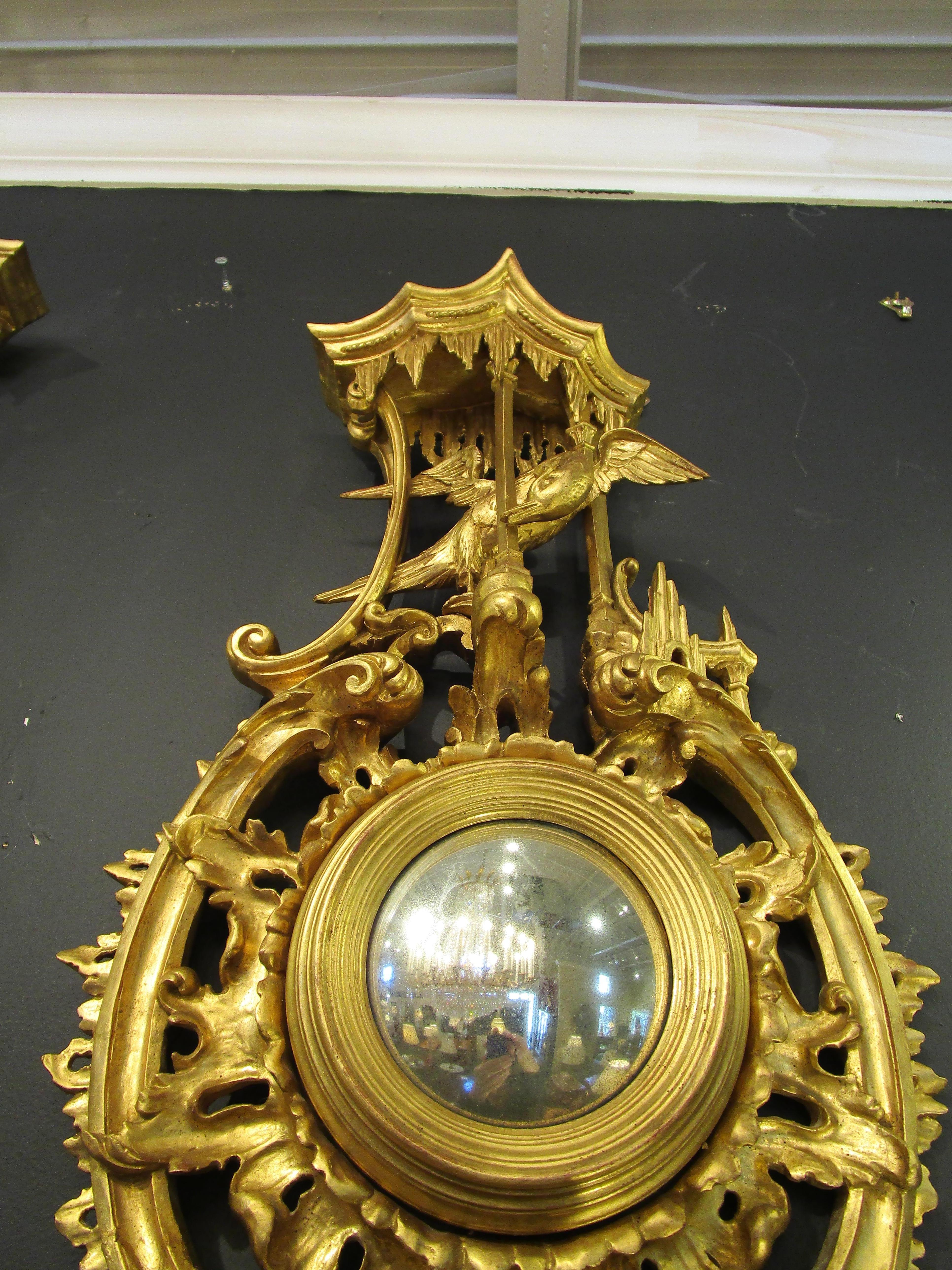 Hand-Carved Pair of Late 19th Century Chinoiserie Carved and Gilt Convex Mirrors For Sale