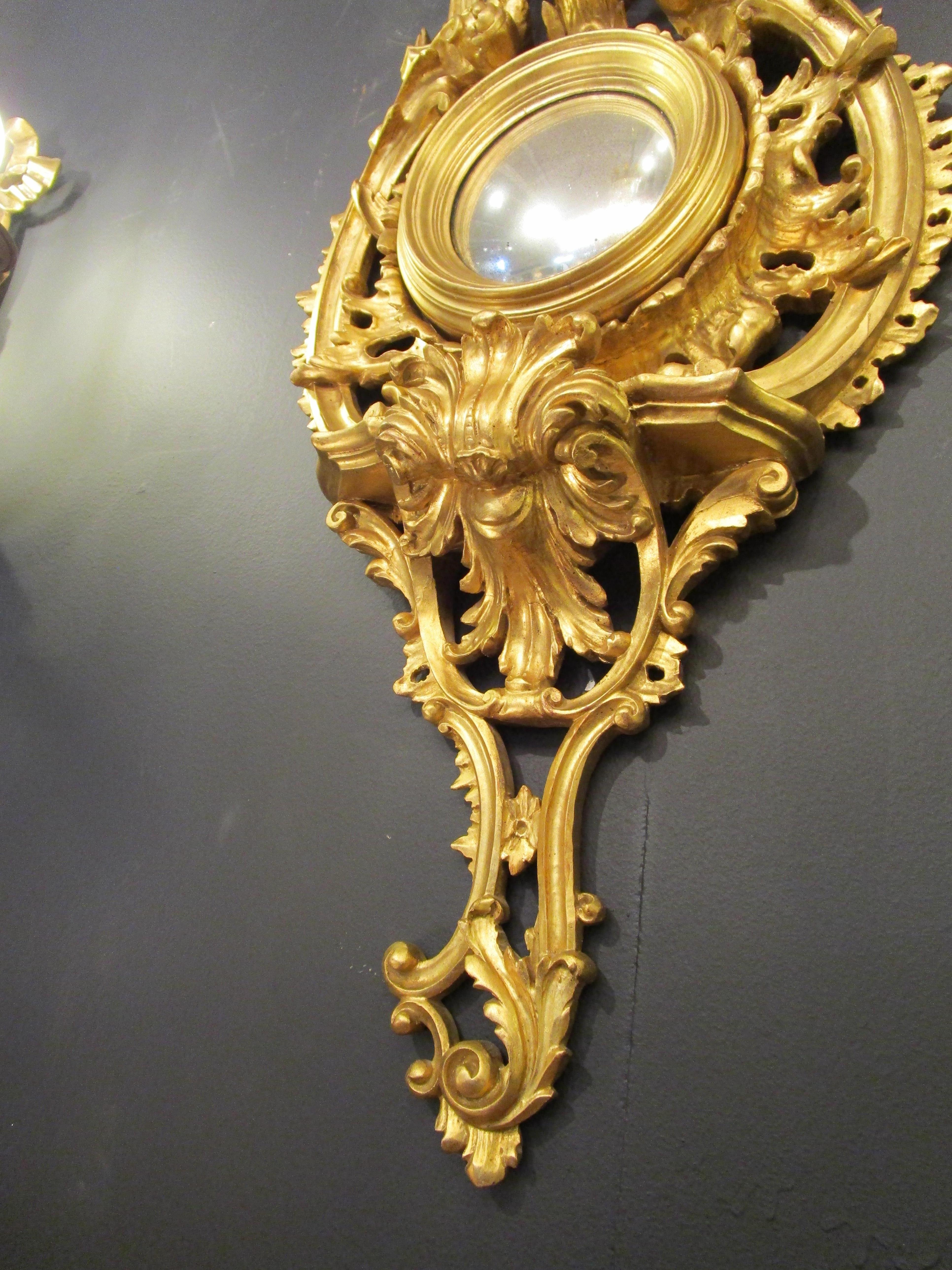 Giltwood Pair of Late 19th Century Chinoiserie Carved and Gilt Convex Mirrors For Sale