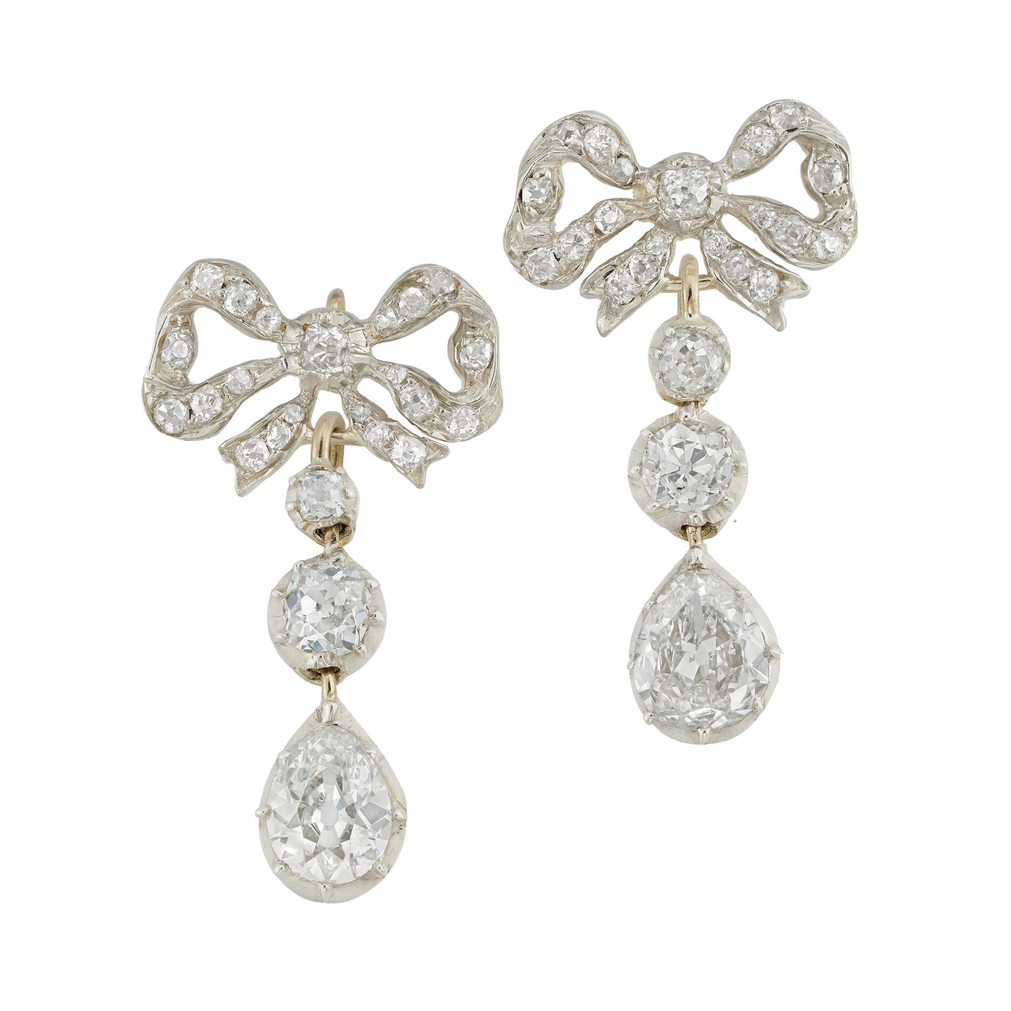 Mixed Cut A pair of late 19th century diamond-set bow earrings For Sale