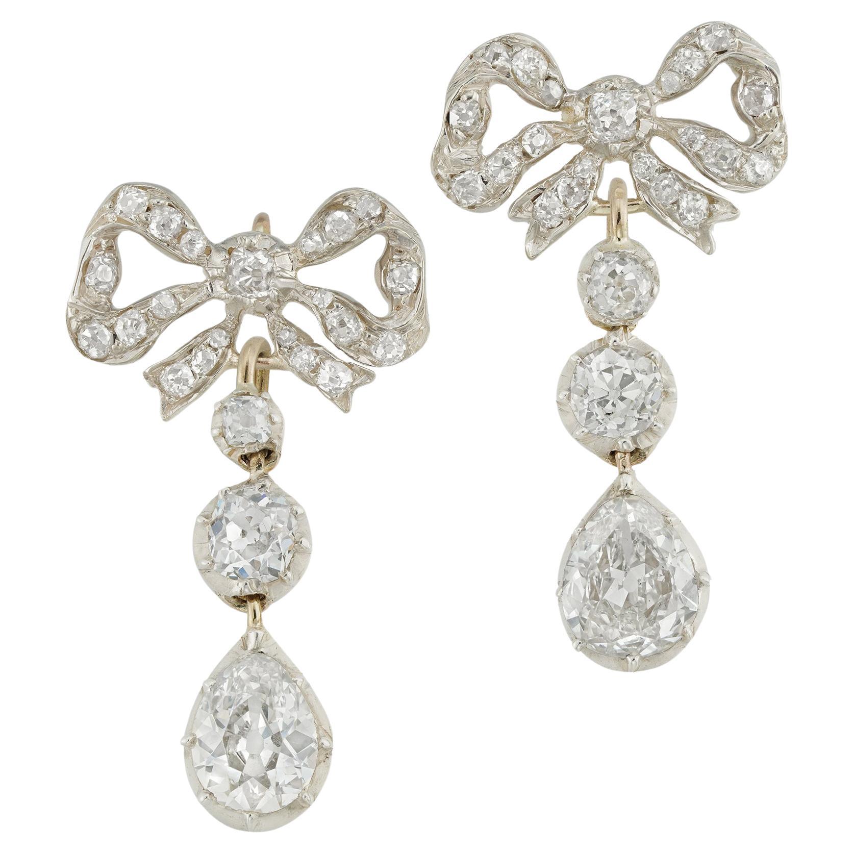 A pair of late 19th century diamond-set bow earrings For Sale