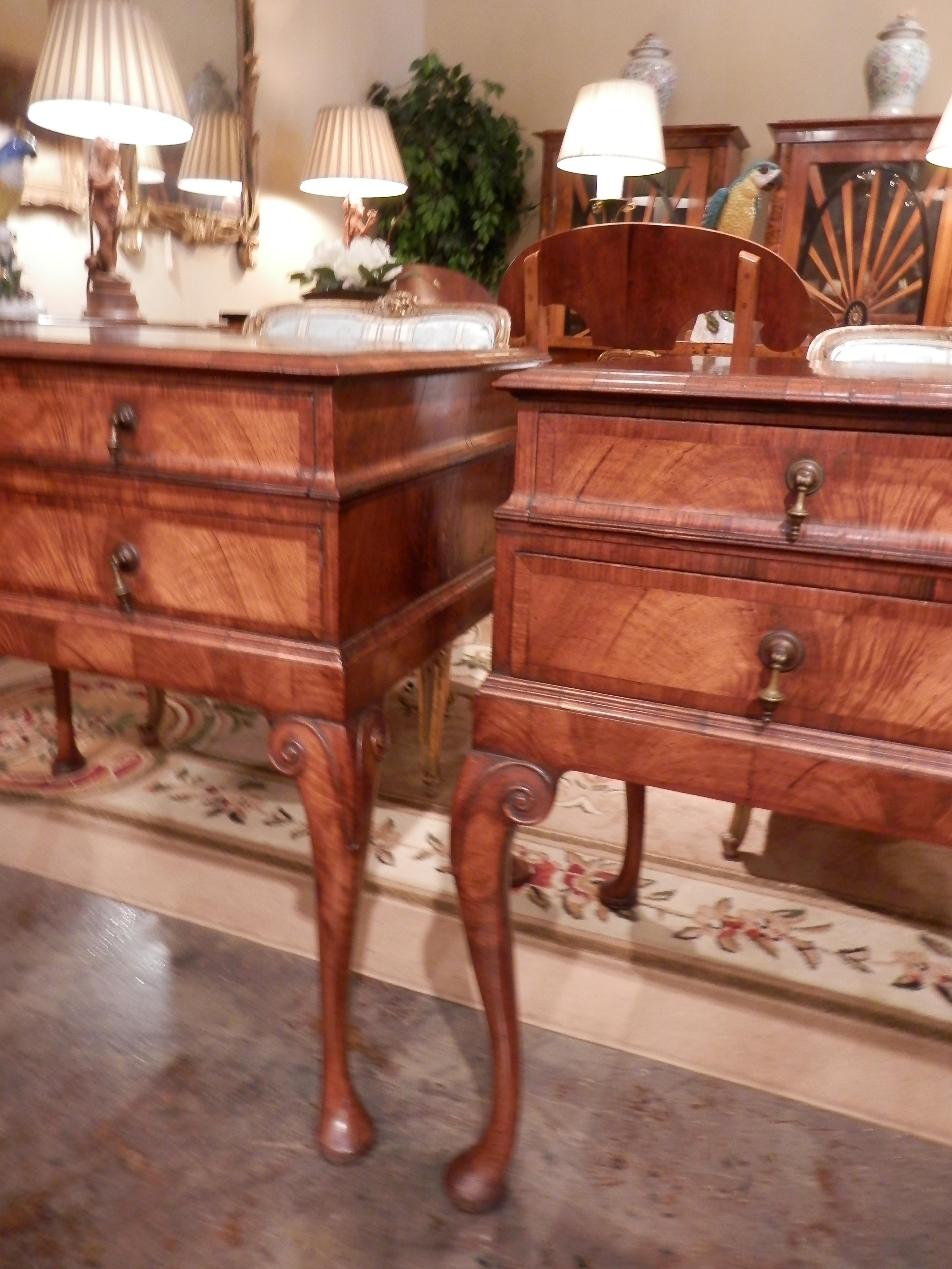 A beautiful pair of 19th century English Queen Anne matched walnut chests on Queen Anne pad feet.