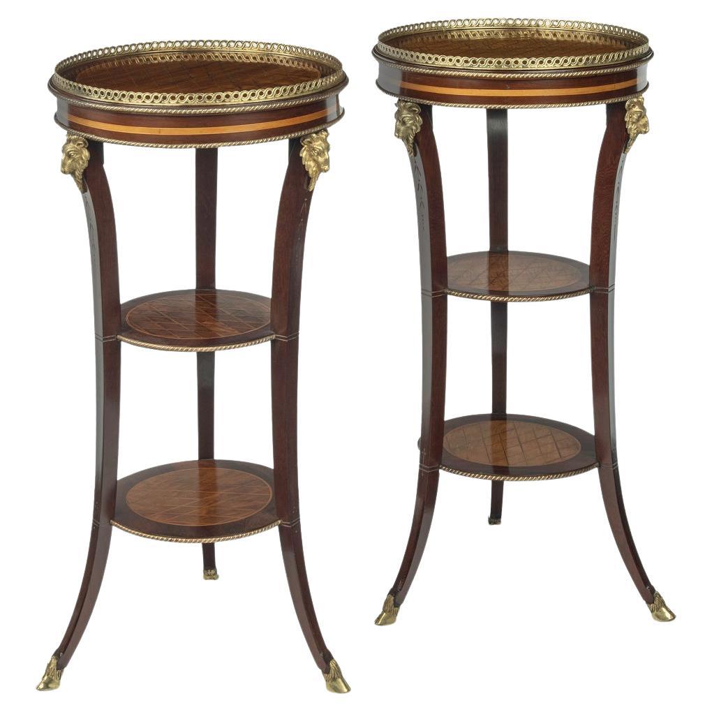 A pair of late 19th century French 3 tier satinwood side tables For Sale