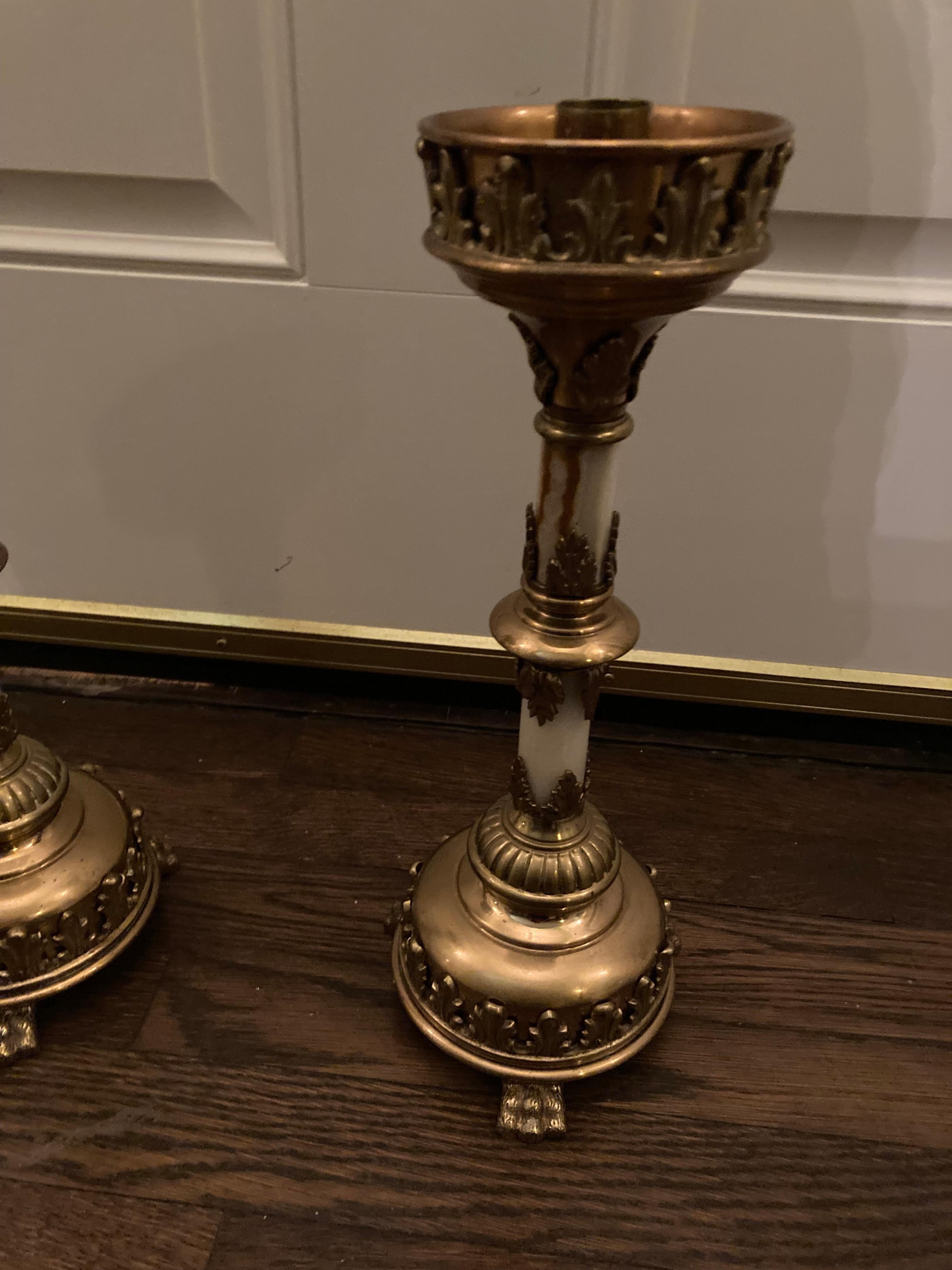 A pair of late 19th century French gilt bronze and agate gothic revival candlesticks. circa 1870-1880
Measures : 5.75 diameter and 13.25 height.
 