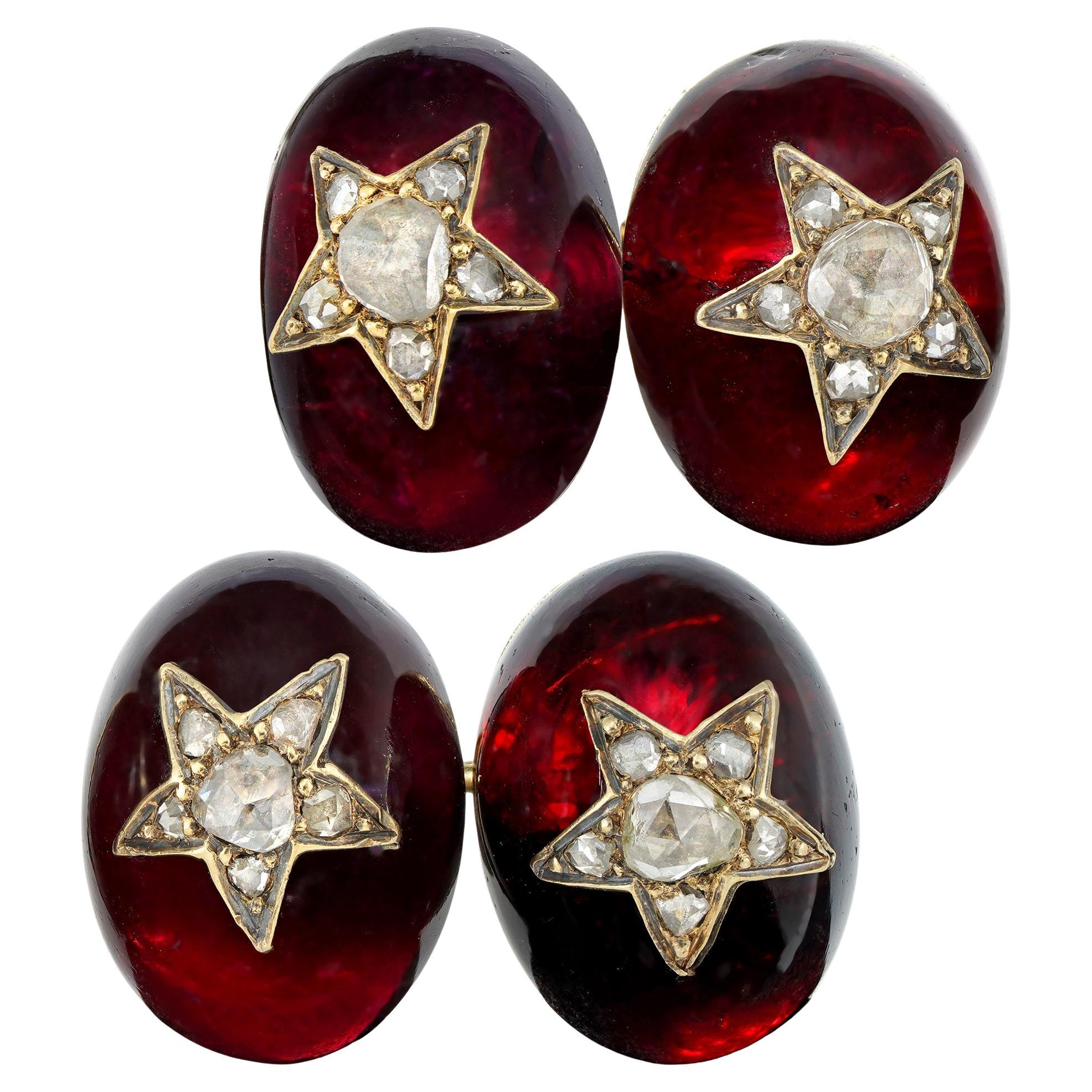 A pair of late 19th century garnet and diamond cufflinks