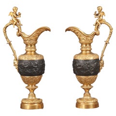 Pair of Late 19th Century Gilt Bronze and Patinated Bronze Ewers