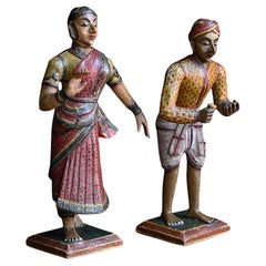 Pareja de figuras indias de madera pintadas y policromadas de finales del siglo XIX