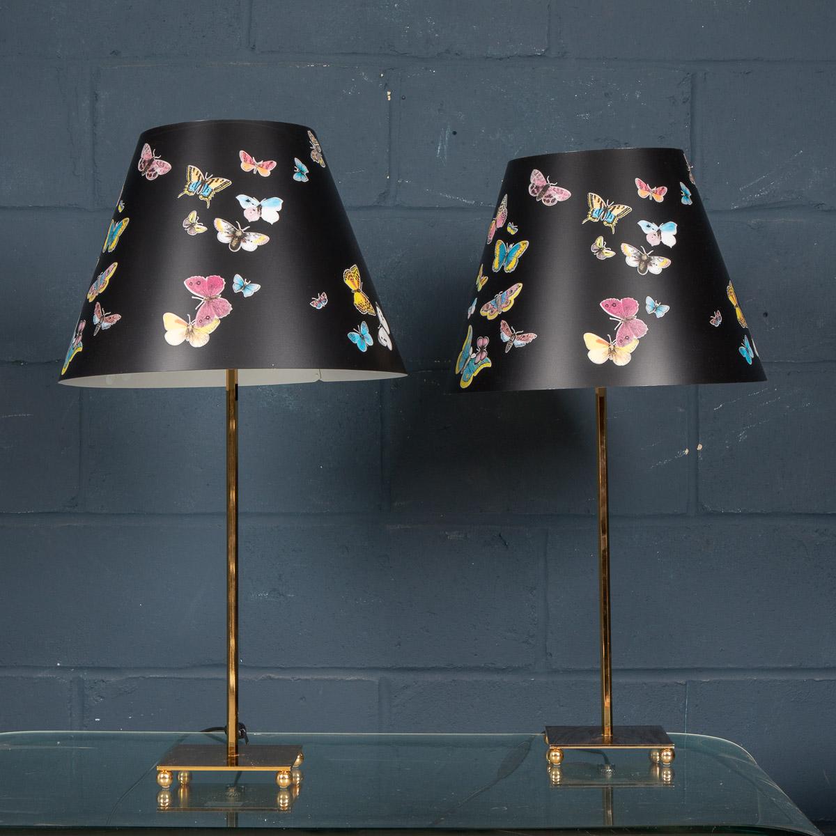 A beautiful pair of table lamps by Piero Fornasetti. This particular model retailed by Antonangeli in the 1990s, now discontinued and appreciating in value. More importantly it gives any room a very chic twist on lighting with its brushed steel