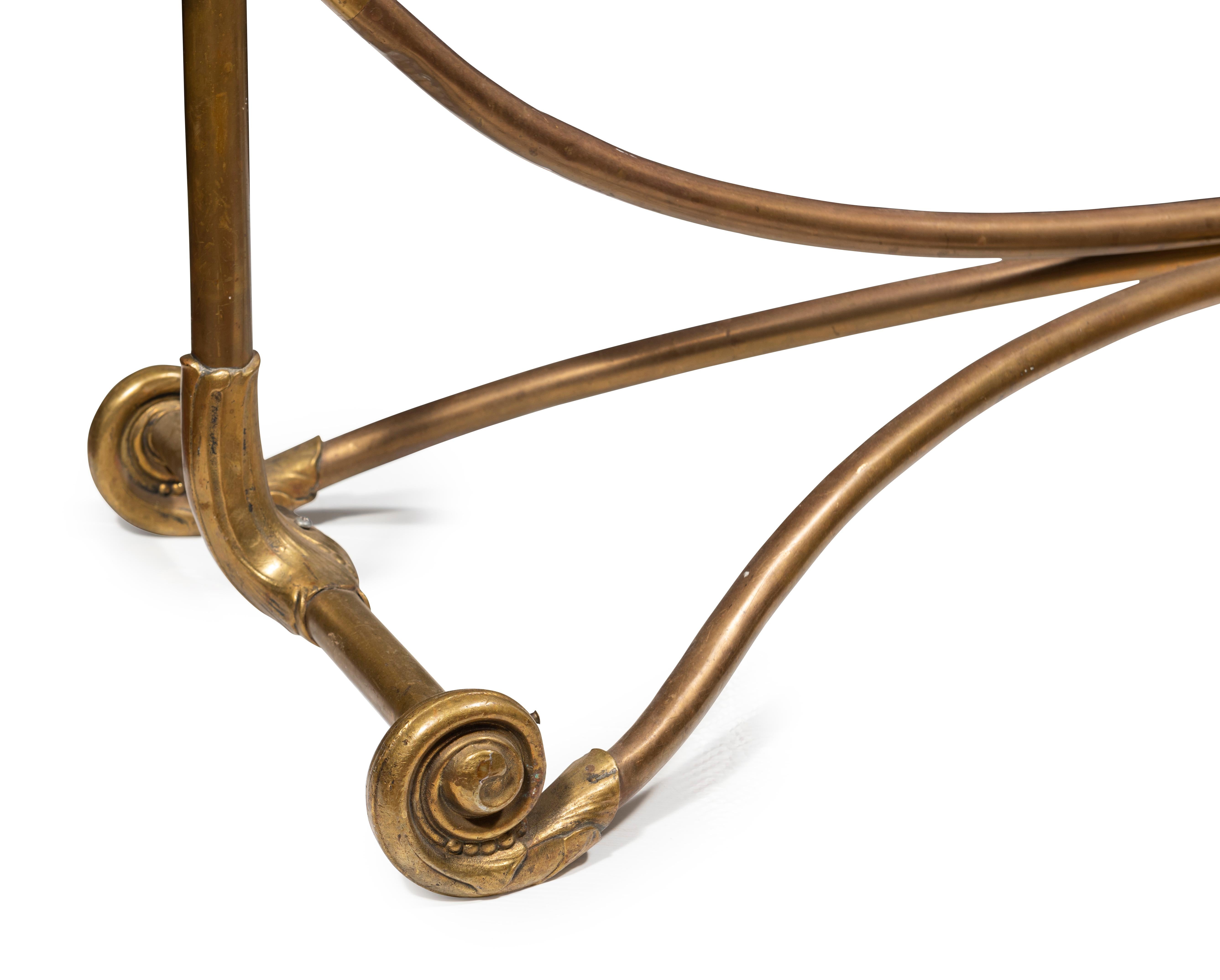 The curved rails with lily and leaf molding, the bottom rail centred with cartouche impressed with the name BOKA.