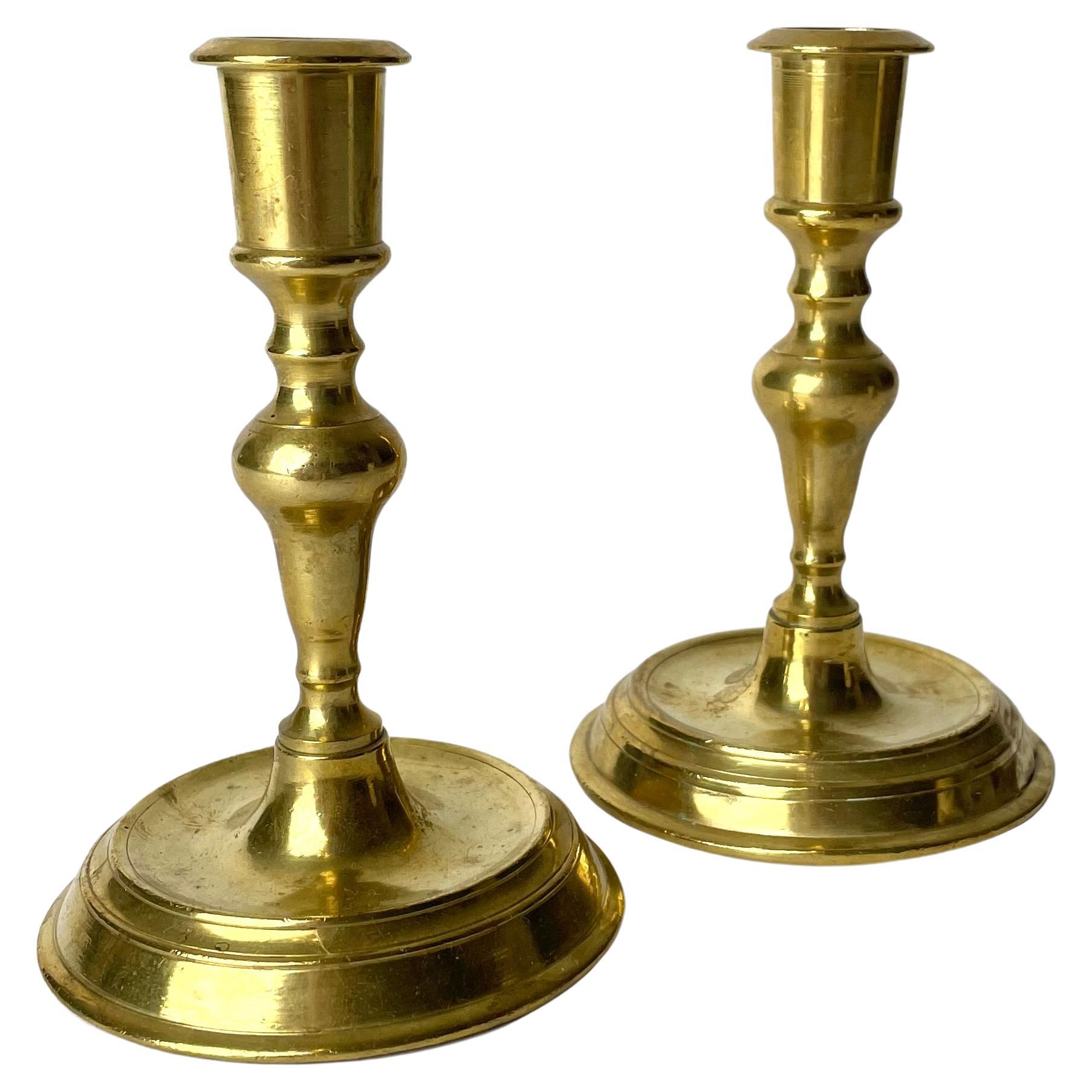 A Pair of Late Baroque Candlesticks, Brass, Early 18th Century For Sale