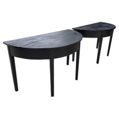 A Pair of Late Georgian Ebonised Console Tables
