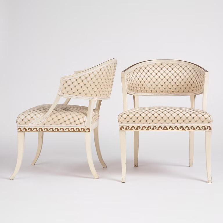 A pair of late Gustavian open-armchairs by E. Öhrmark (master in Stockholm 1777-1813).

This exceptional pair of Gustavian open armchairs, crafted by the distinguished Swedish artisan E. Ohrmark, embodies the timeless elegance and restrained beauty