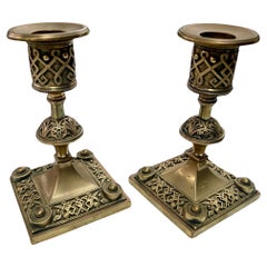 A Pair Of  Late Victorian Aesthetic Brass Candlesticks
