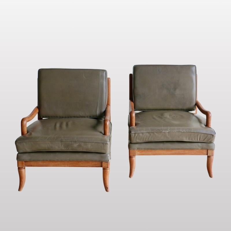 Mid-20th Century A pair of leather armchairs For Sale