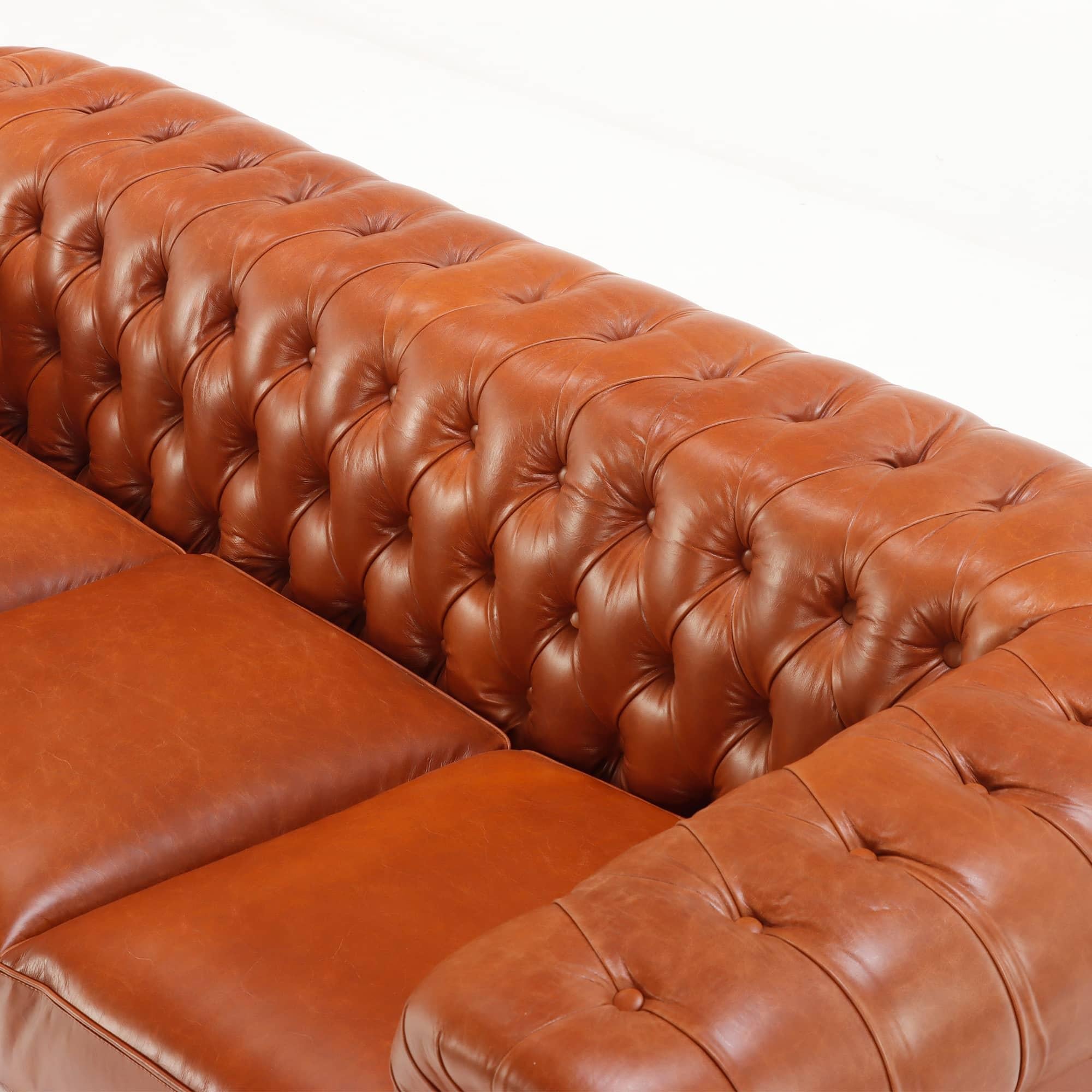 Leather A pair of leather Chesterfield style sofas. Made to order. For Sale