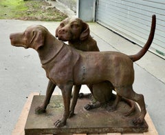 A Pair of Life-size Labradors/ Weathered Cast Iron Statue on a Plinth