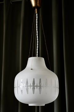 A pair of lighting pendant by Harald Notini for Arvid Böhlmarks Lampfabrik