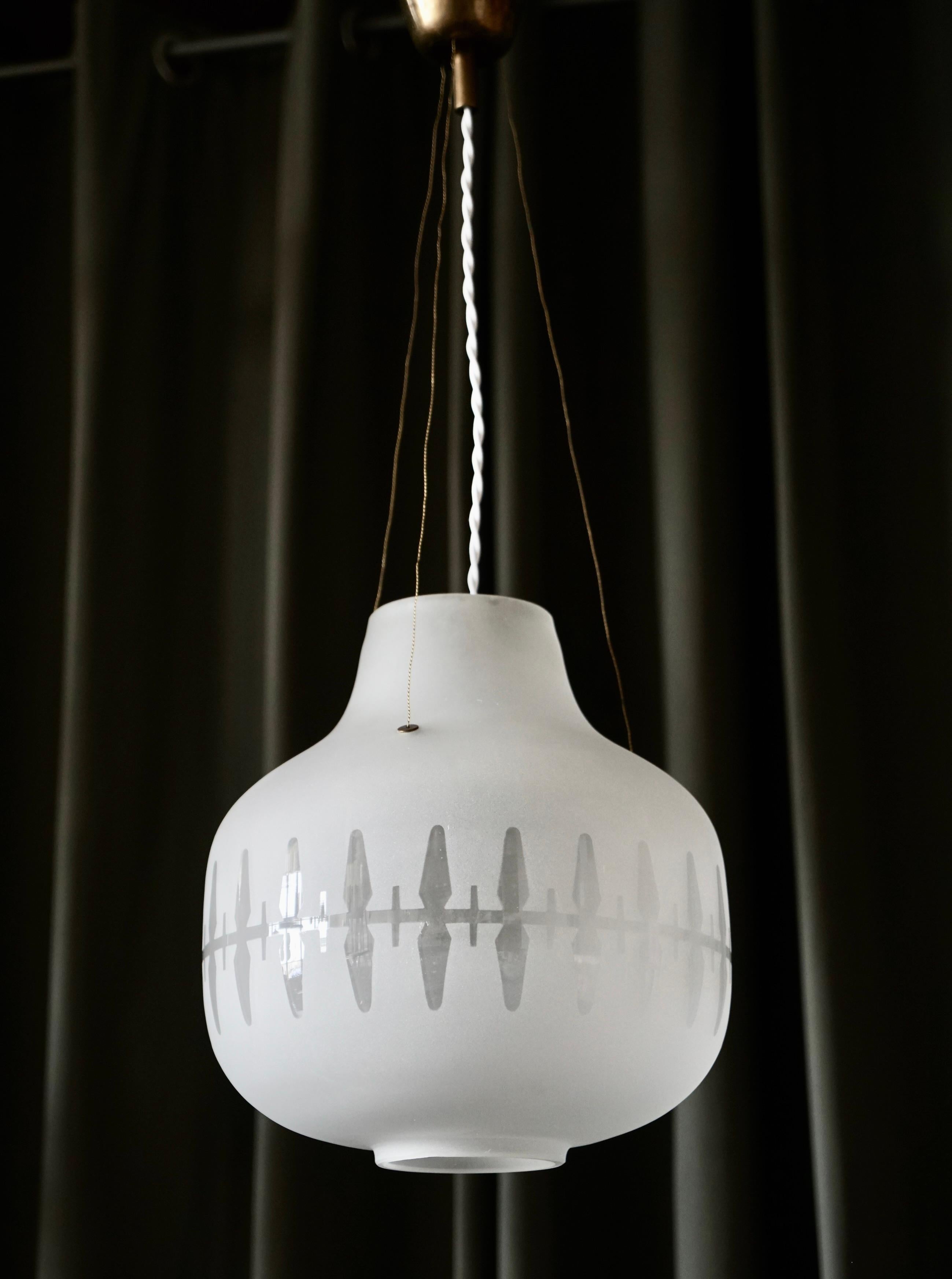 Scandinavian Modern A pair of lighting pendant by Harald Notini for Arvid Böhlmarks Lampfabrik For Sale