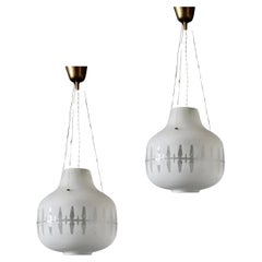 A pair of lighting pendant by Harald Notini for Arvid Böhlmarks Lampfabrik