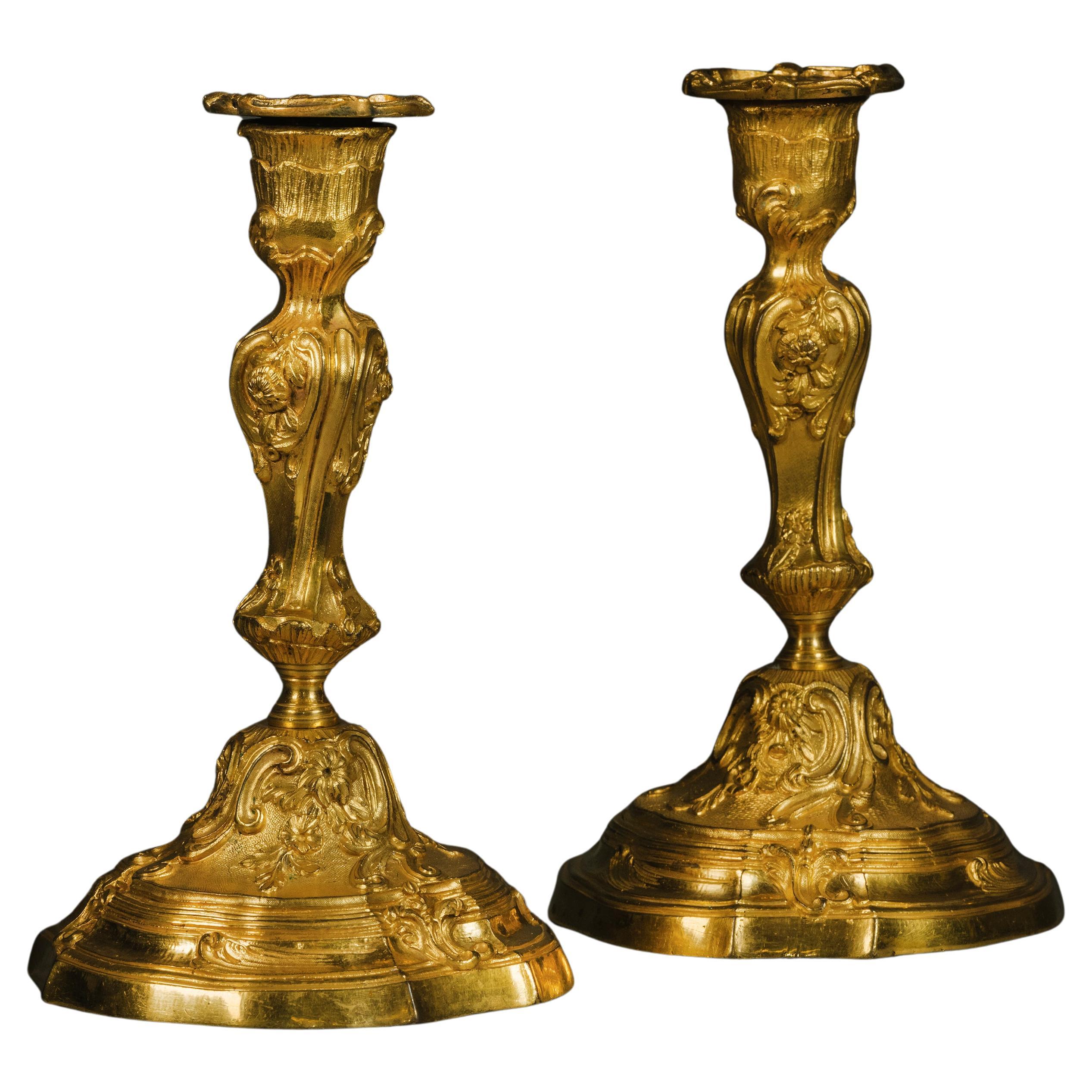 A Pair of Louis XV Style Candlesticks