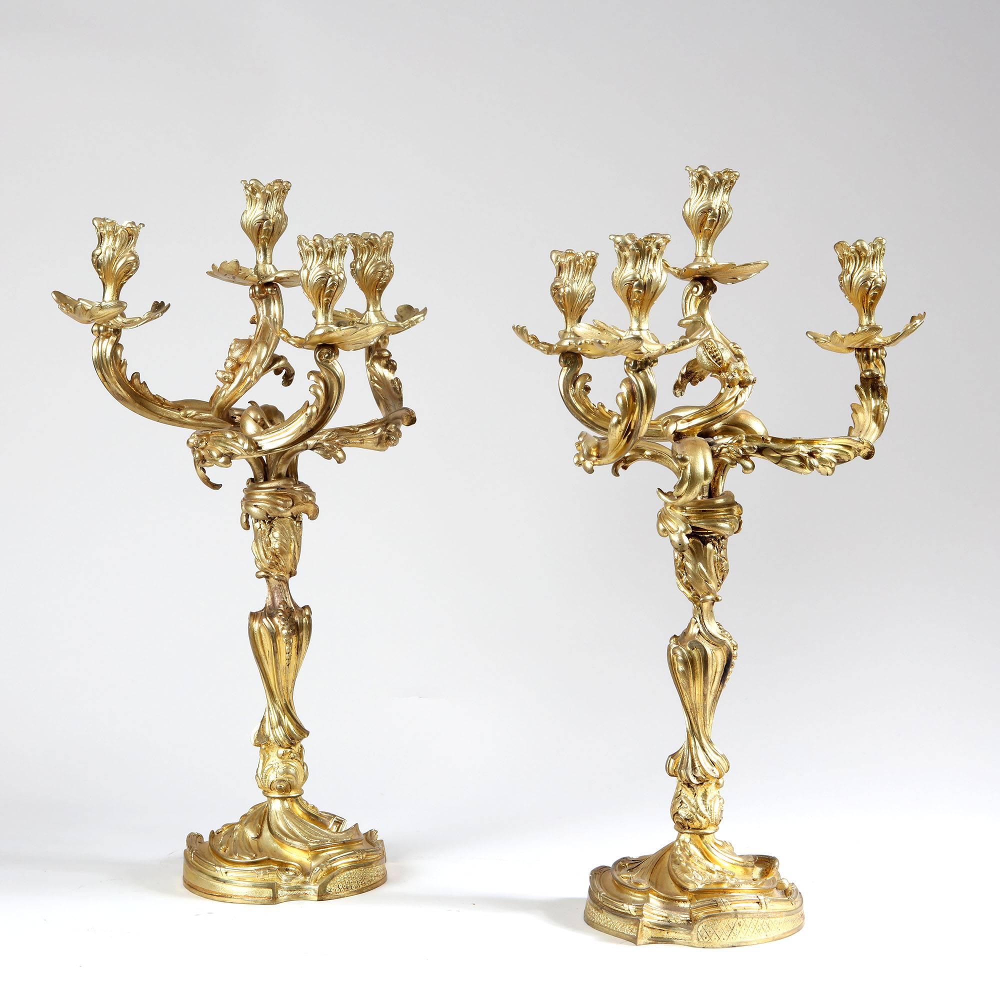 A pair of Louis XV style four-light ormolu candelabra (Electrified)

France, circa 1900 

Measures: Height 57cm 
Diameter 35cm.