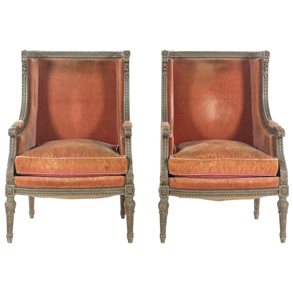 Pair of Louis XVI Carved and Painted Walnut Bergeres a L'Oreilles, 18th Century