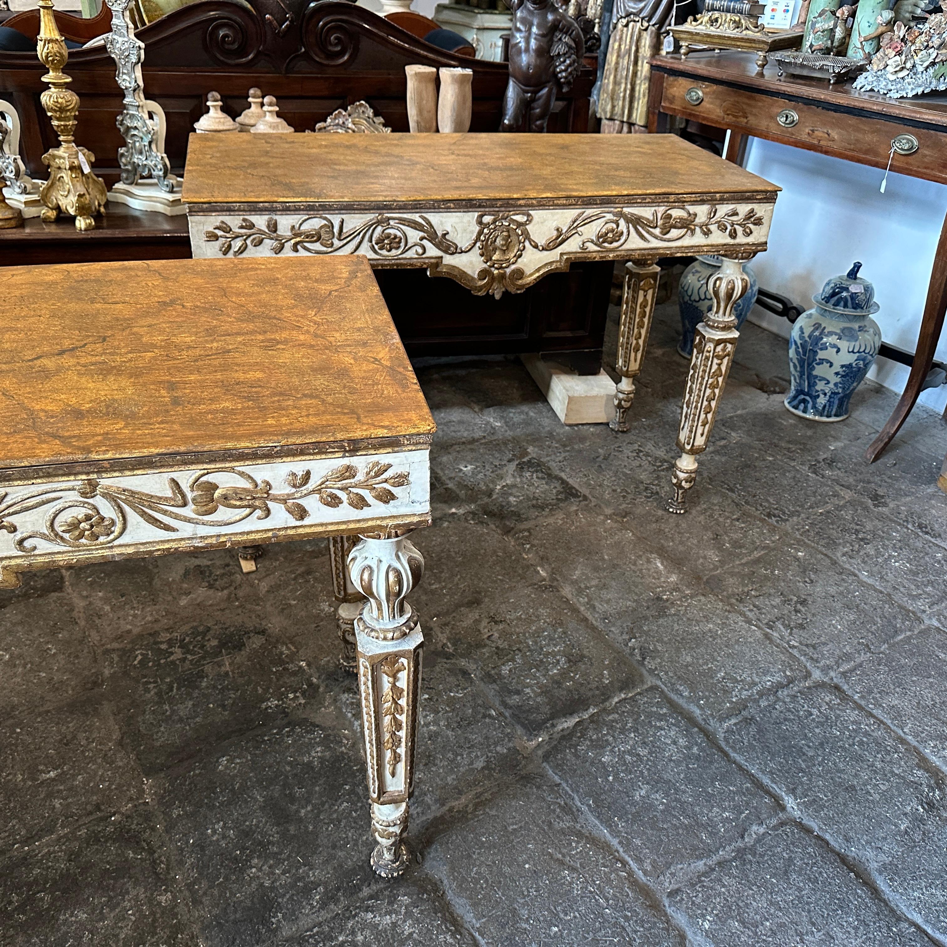 Hand-Carved A pair of Louis XVI Ivory Lacquered and Gilded Wood Italian Consoles For Sale