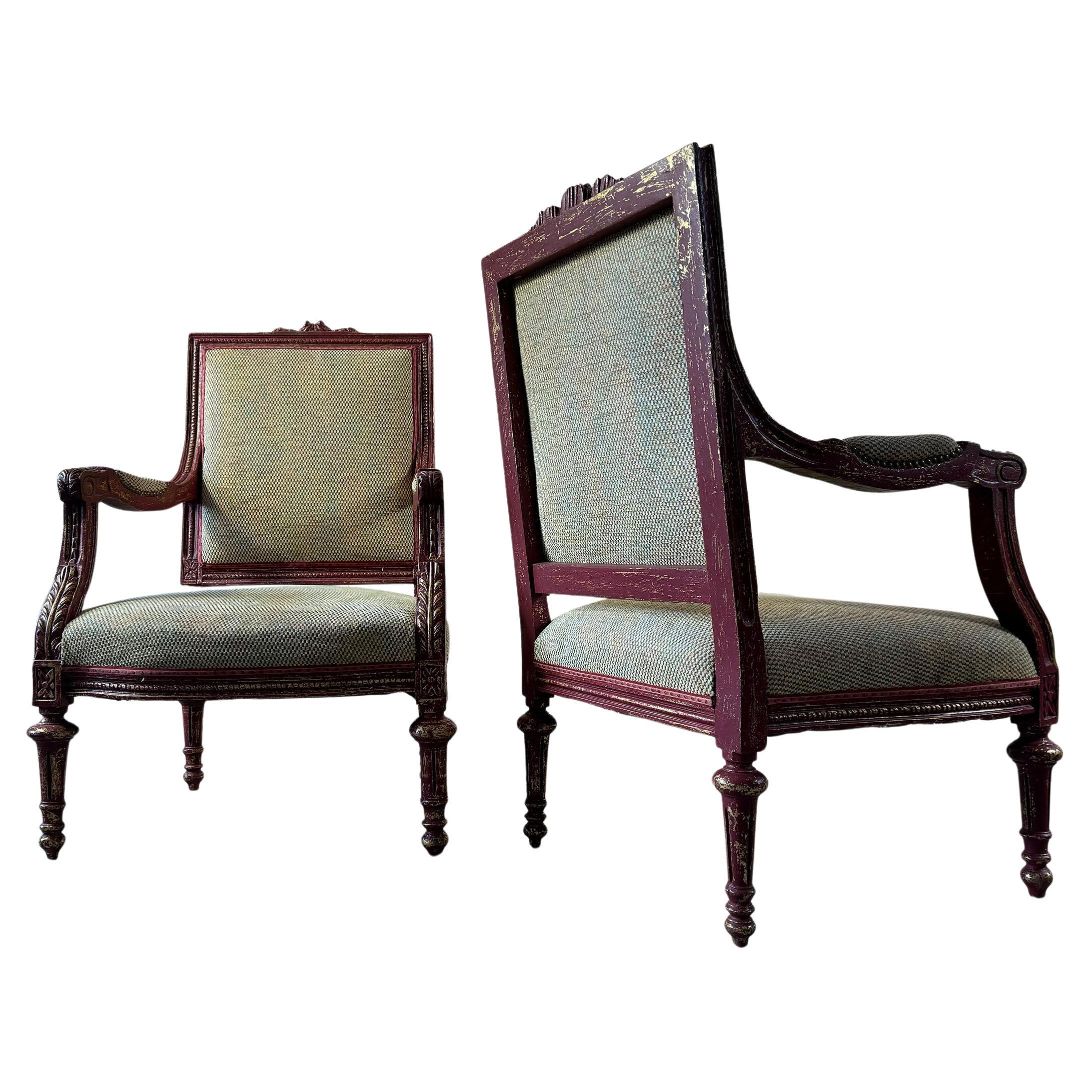 Circa 1900 this pair of antique armchairs have been painted over the gilt.  This paint has then been rubbed back revealing the gilt in places.

The seats and the more recent upholstery is in fair condition with no marks.

Structurally these are very